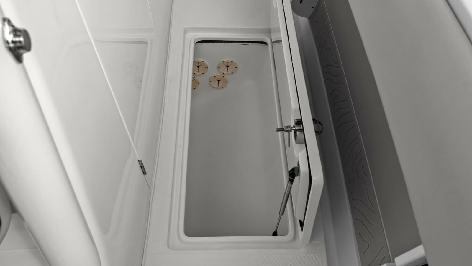 Spacious In-Deck Storage Compartment