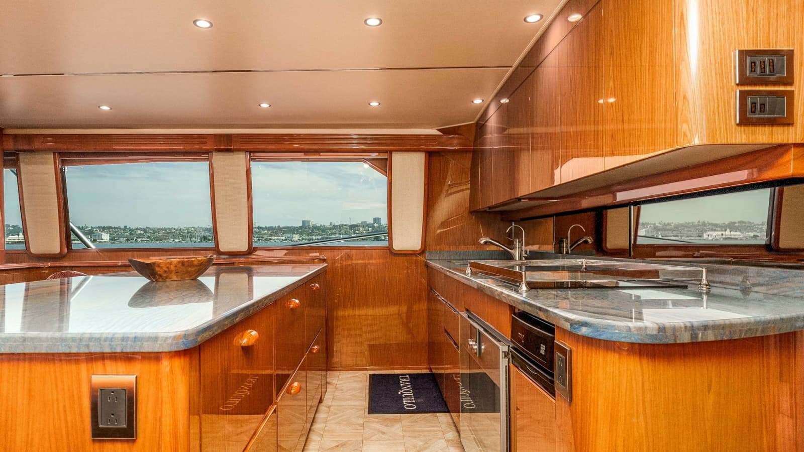 2014 Viking 76 Enclosed Bridge "TRANQUILO" Exudes Elegance with its High-Gloss Wooden Cabinetry and Sleek Countertops