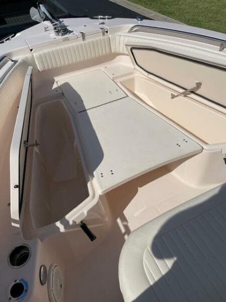 2014 Grady-White Fisherman 257 boat interior with seating and storage compartments.