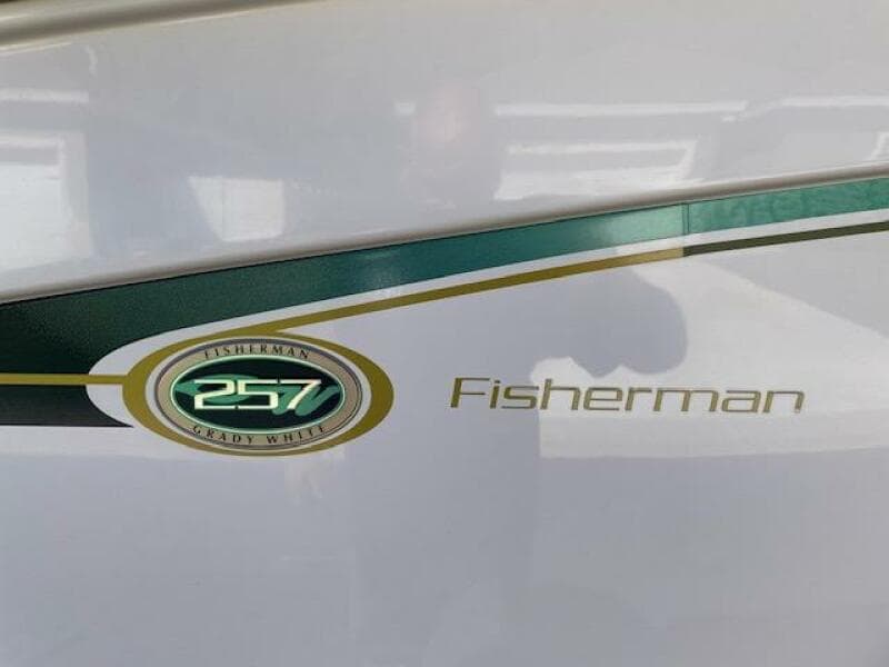 2014 Grady-White Fisherman 257 boat logo and model name on hull.