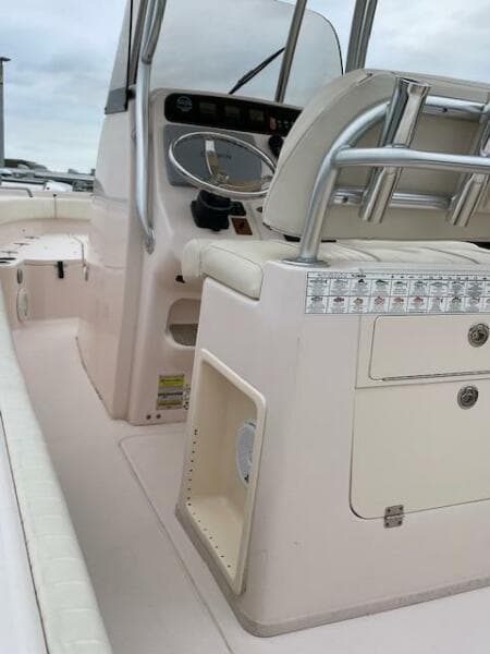 2014 Grady-White Fisherman 257 center console boat interior with helm and seating.