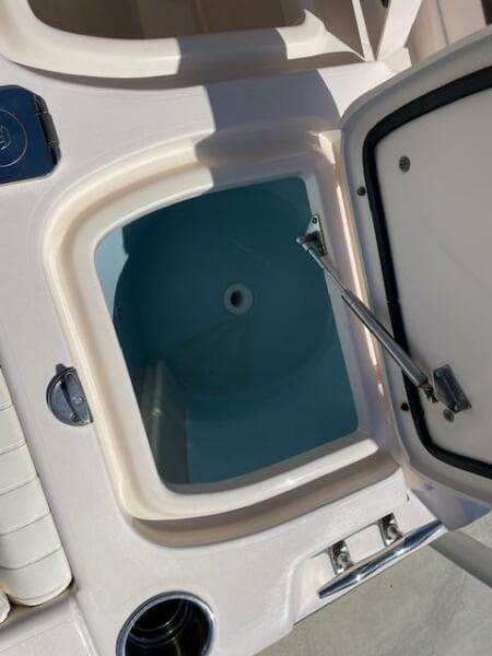 2014 Grady-White Fisherman 257 open storage compartment.