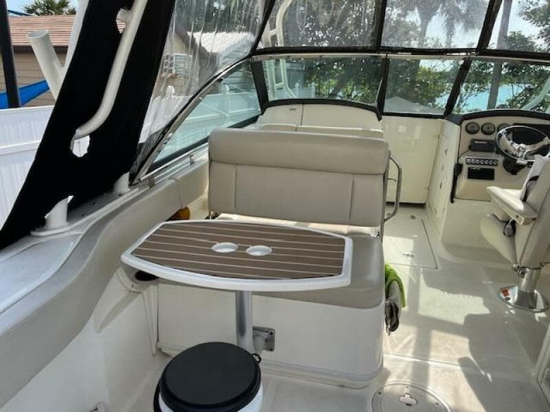 2018 Boston Whaler 270 Vantage boat interior with seating and table.