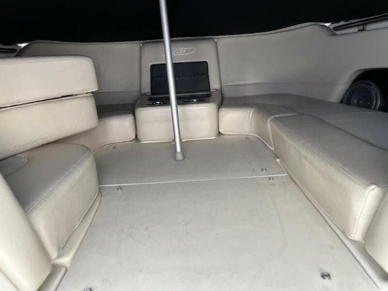 2018 Boston Whaler 270 Vantage boat interior with beige seating and storage compartments.