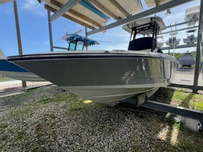 2023 Boston Whaler 250 Dauntless boat on a rack, side view.