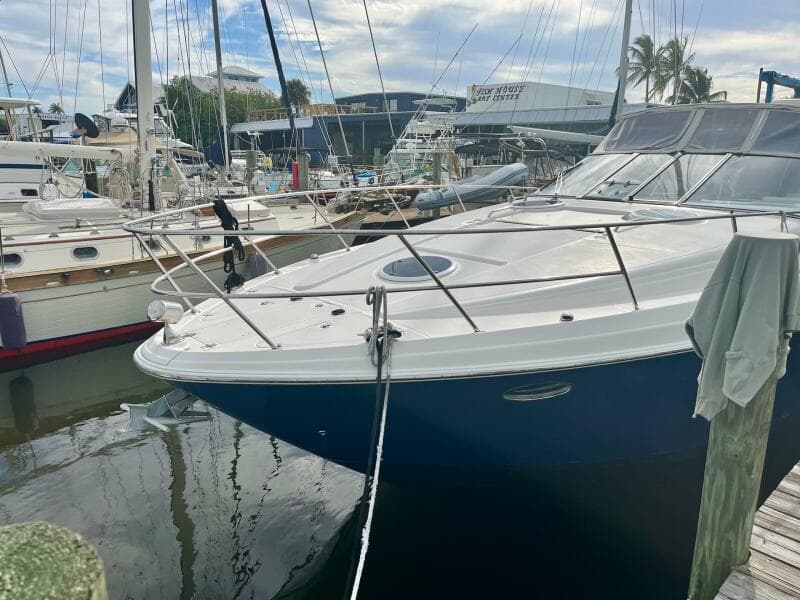 2003 Regal Commodore 3860 yacht docked at a marina.