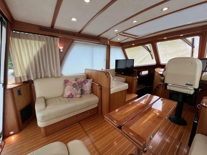 Luxurious interior of 2013 Sabre 48 Salon Express yacht with elegant wood finishes.
