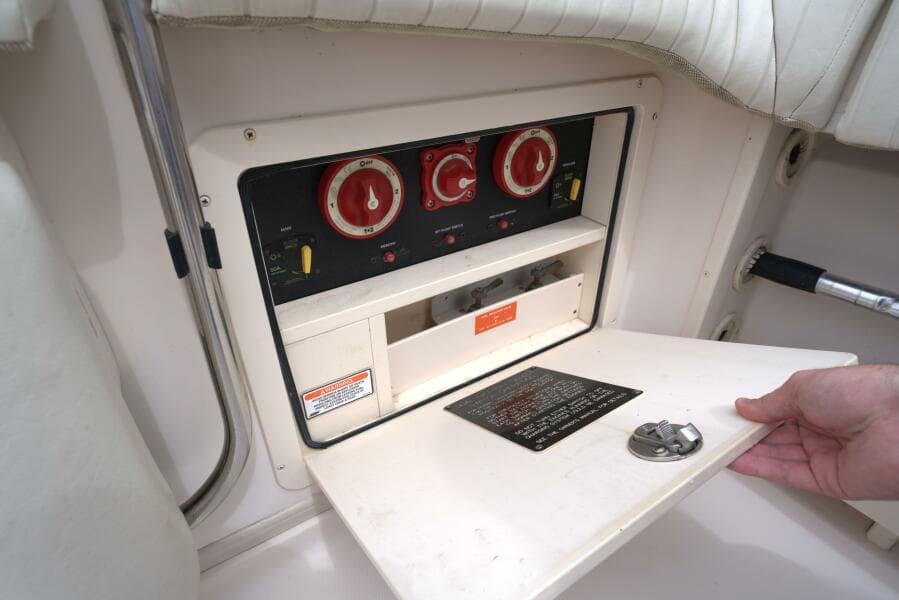 2007 Grady-White Express 330 control panel with switches and dials.