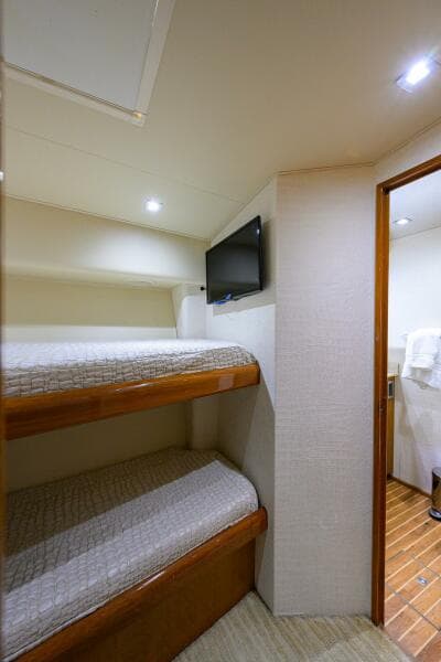 2004 Viking 65 Enclosed Bridge w/Tower cabin with bunk beds and TV
