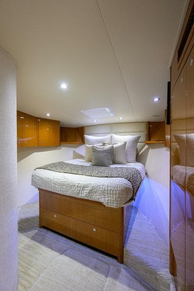 Luxurious bedroom in 2004 Viking 65 Enclosed Bridge w/Tower yacht.