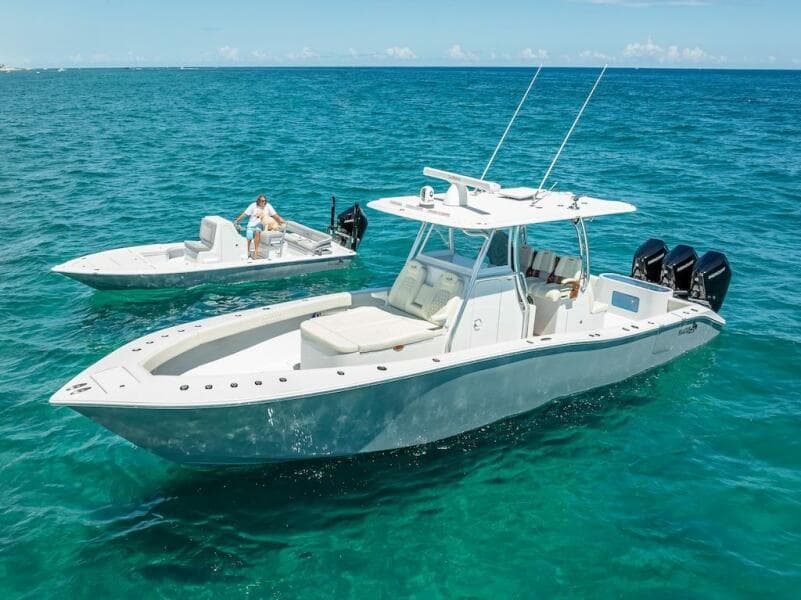 2025 Billfish 39 Center Console with Tower on clear blue ocean.