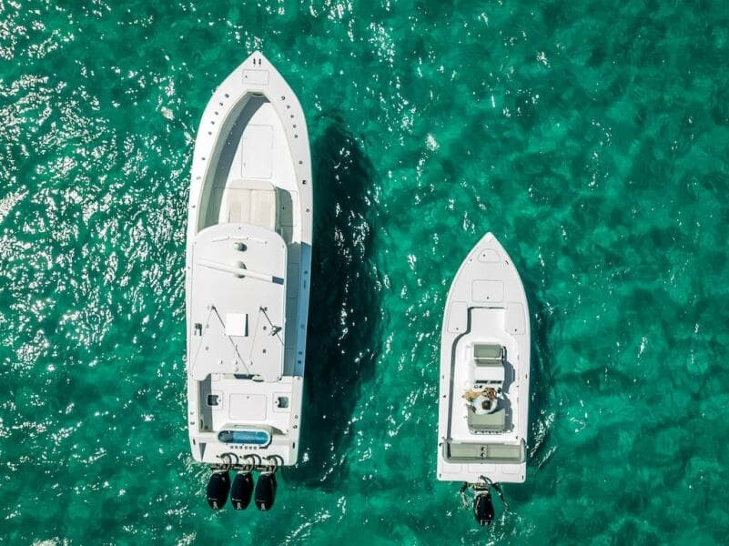 Aerial view of 2025 Billfish 39 Center Console boat on turquoise water.