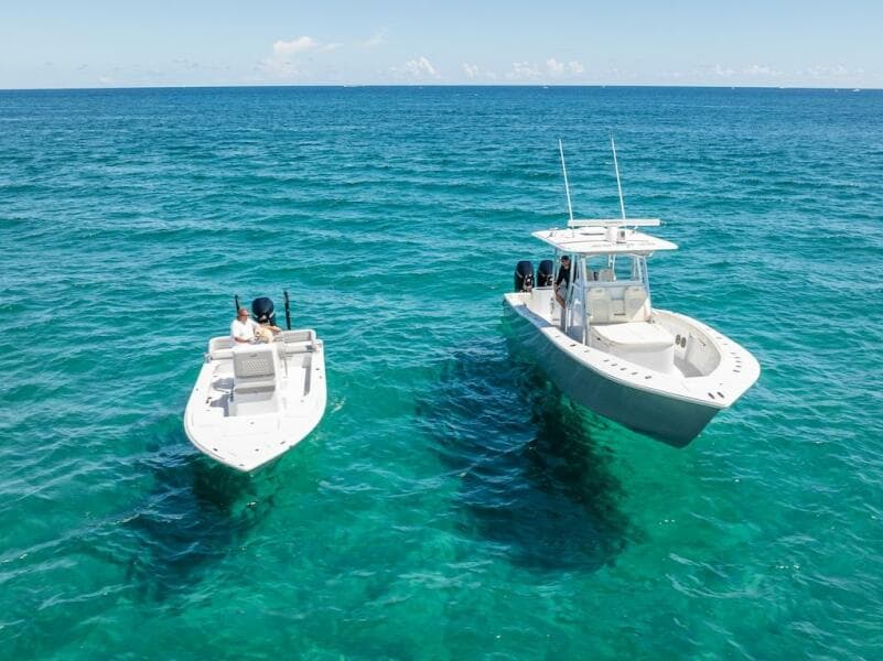 2025 Billfish 39 Center Console w/Tower on clear blue ocean waters.