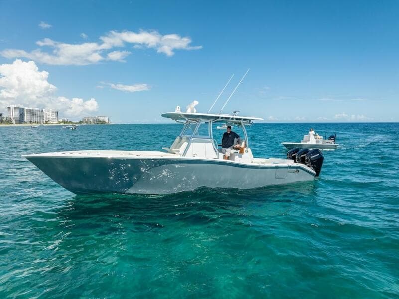 2025 Billfish 39 Center Console boat on clear blue ocean.