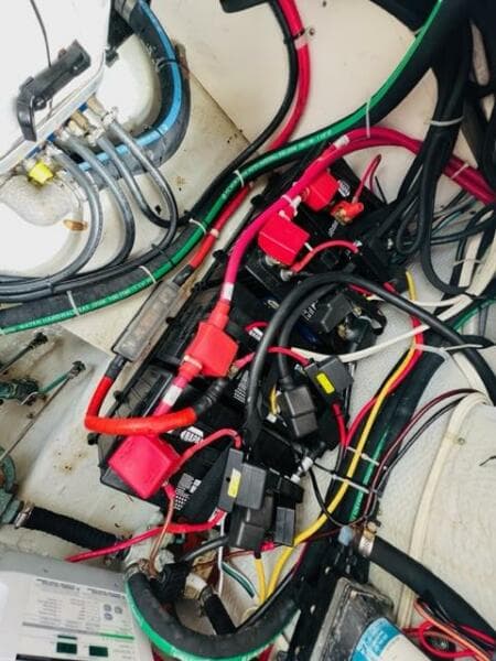 Electrical wiring and components inside a 2014 Grady-White Freedom 335 boat.
