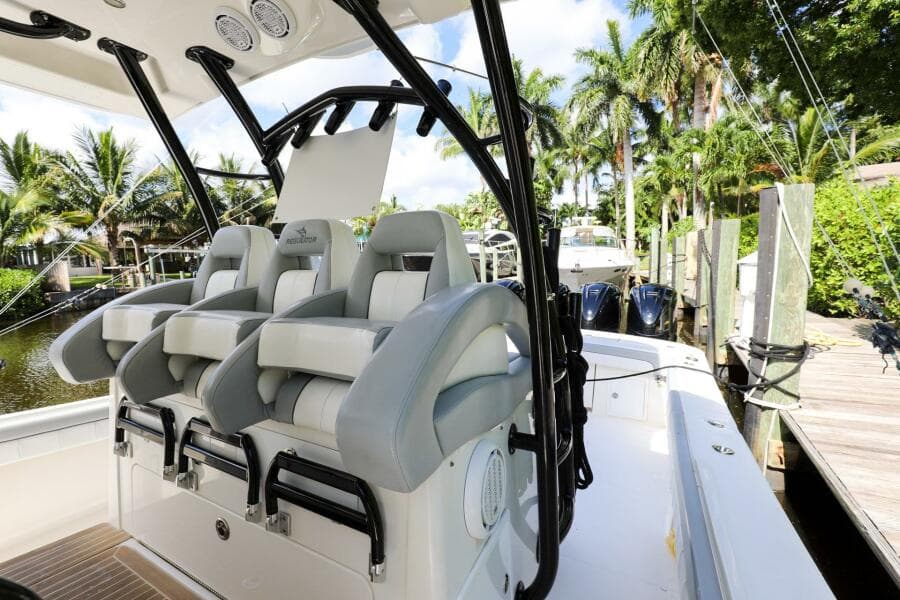 2020 Regulator 41 boat with luxurious seating and modern design at a dock.