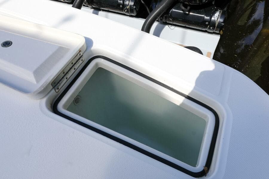 Livewell on a 2020 Regulator 41 boat, open lid, clean water inside.