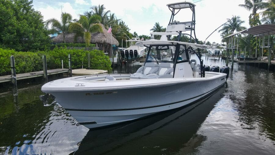 2020 Regulator 41 boat docked in a tropical marina.