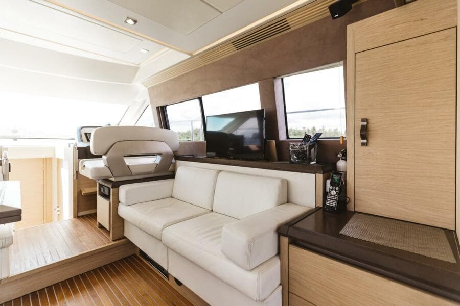 Luxurious interior of 2015 Beneteau Monte Carlo 5 yacht with modern furnishings.