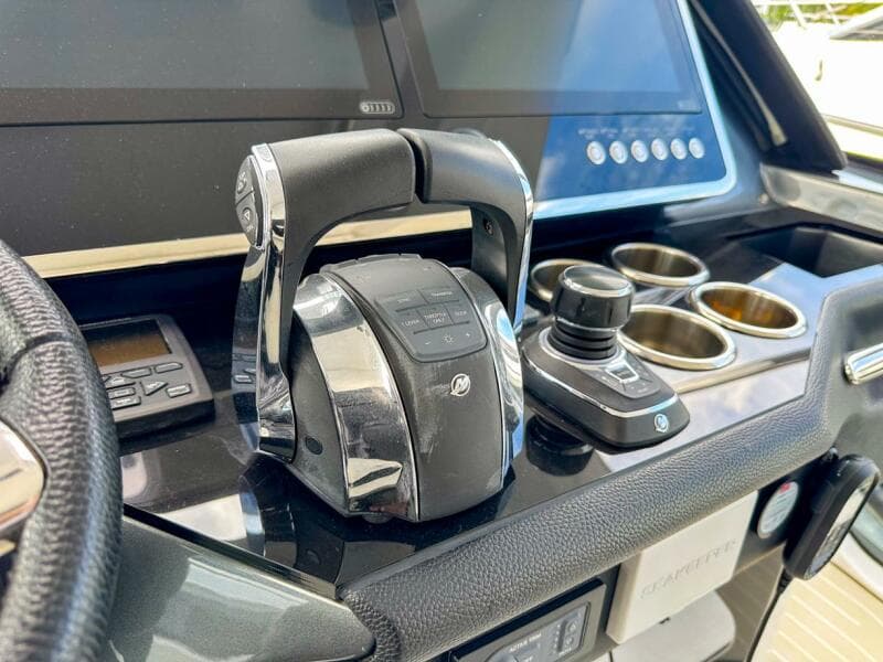 Control panel of 2023 Azimut Verve 47 yacht with throttle and joystick.