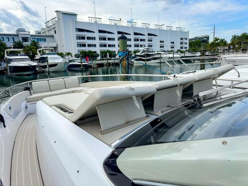2023 Azimut Verve 47 yacht docked at marina with luxurious seating.