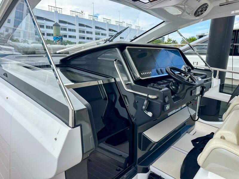 2023 Azimut Verve 47 yacht cockpit with modern steering and navigation controls.