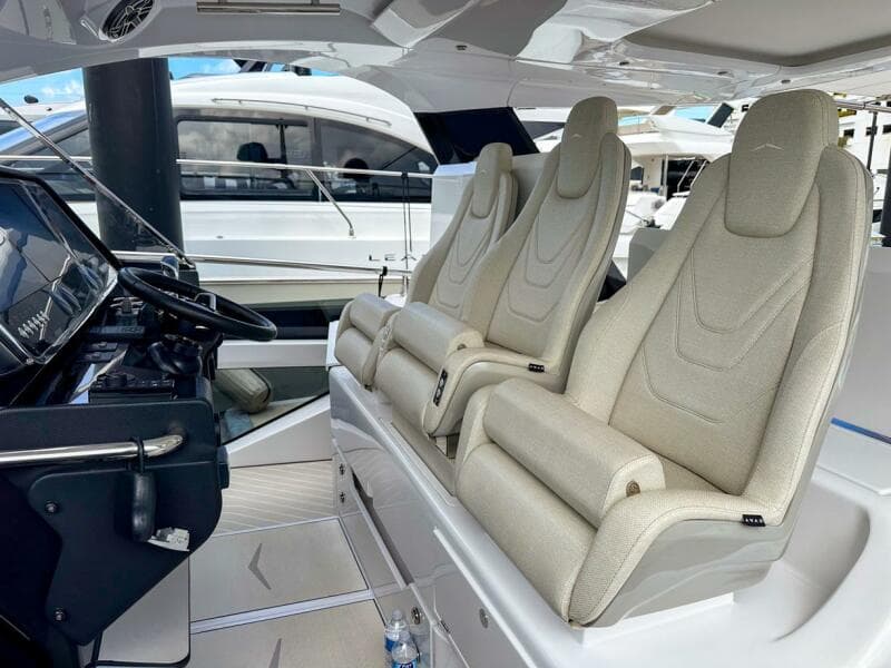 2023 Azimut Verve 47 interior with luxurious seating and modern helm controls.