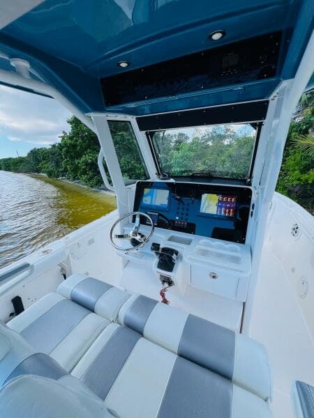 2012 Everglades 295 Center Console boat interior with modern dashboard and seating.