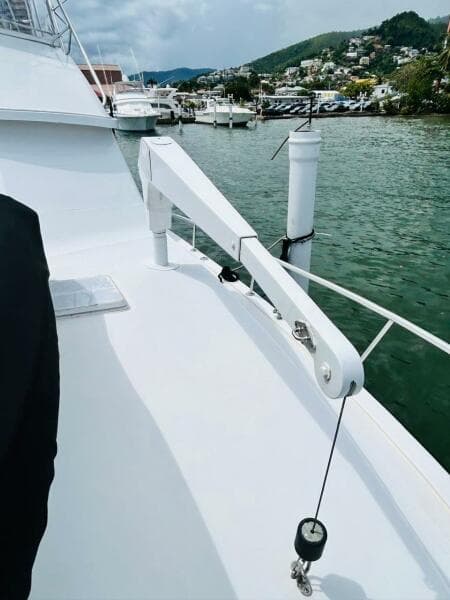 1988 Bertram 54' yacht deck with scenic marina view.