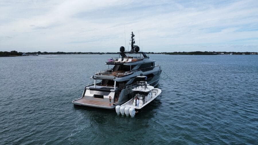 Luxury yacht Majesty 120 (2025) cruising on open water under a clear sky.