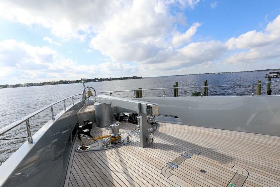 Majesty 120 yacht deck, 2025 model, overlooking serene waters and blue sky.