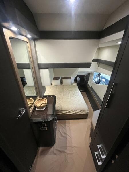 2017 Marquis 500 Sport Yacht bedroom with modern interior design.