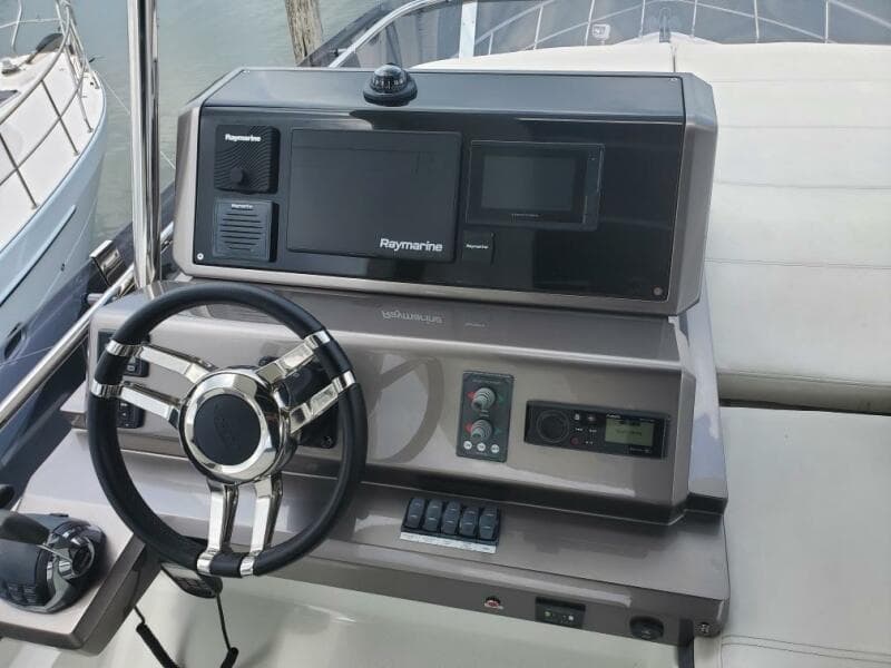 2020 Galeon 500 Fly yacht helm with Raymarine navigation system.