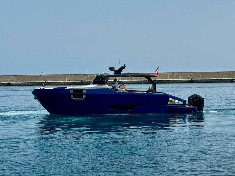 Aicon Audace 50 yacht, 2025 model, cruising in a calm harbor.