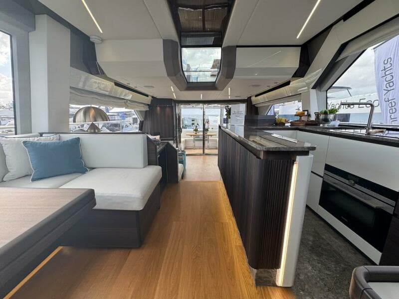 Luxurious interior of 2024 Aicon 66 Vivere yacht with modern design and spacious layout.