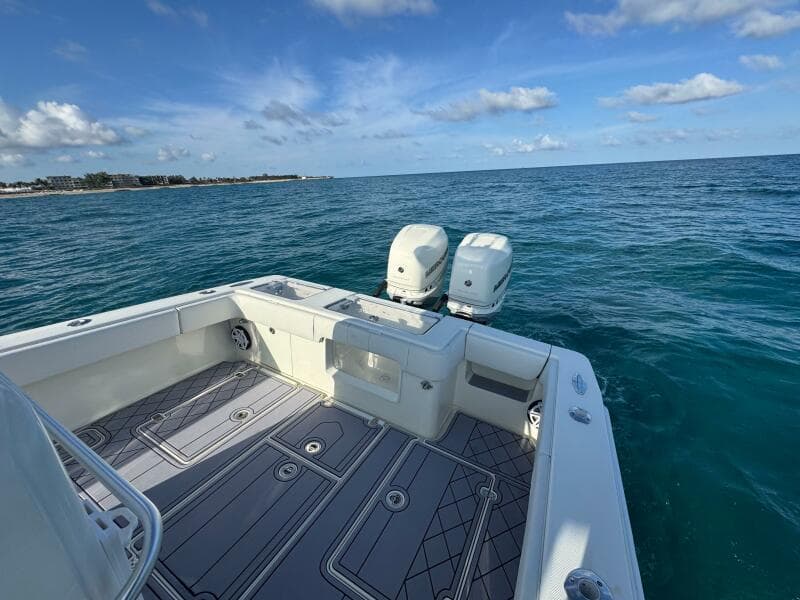 2017 SeaVee 340Z boat with dual engines on open ocean, clear sky.