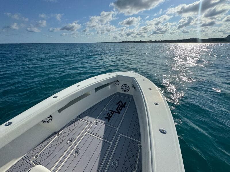 2017 SeaVee 340Z boat on calm ocean waters under a partly cloudy sky.