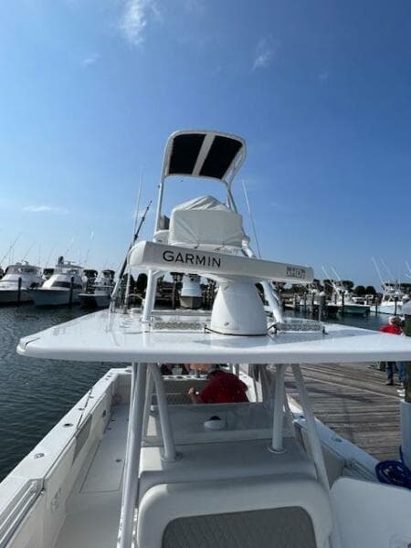 2020 SeaHunter 39 Tournament boat docked, featuring Garmin equipment under a clear blue sky.