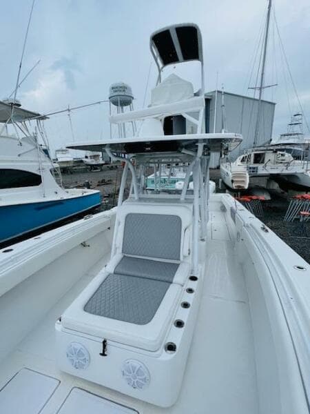 2020 SeaHunter 39 Tournament boat with elevated helm, docked in a marina.