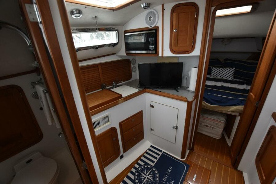 1999 Legacy 34 Express