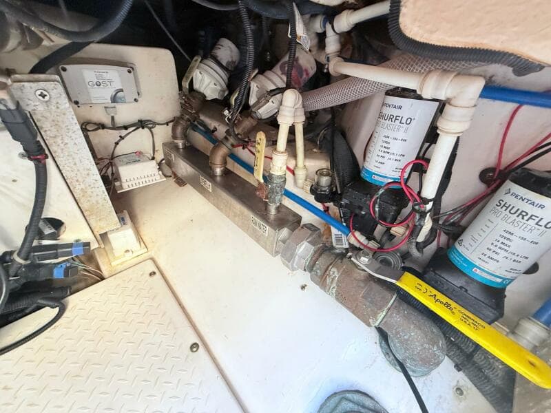 Engine compartment of a 2014 Everglades 355 Center Console with Shurflo components.