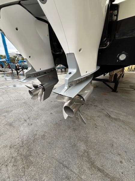 Twin outboard motors on a 2013 Statement 35 Center Console boat.