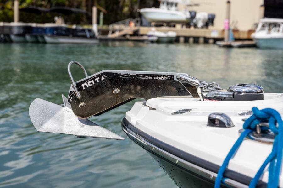2023 Monterey 255 Super Sport boat with Delta anchor in marina setting.