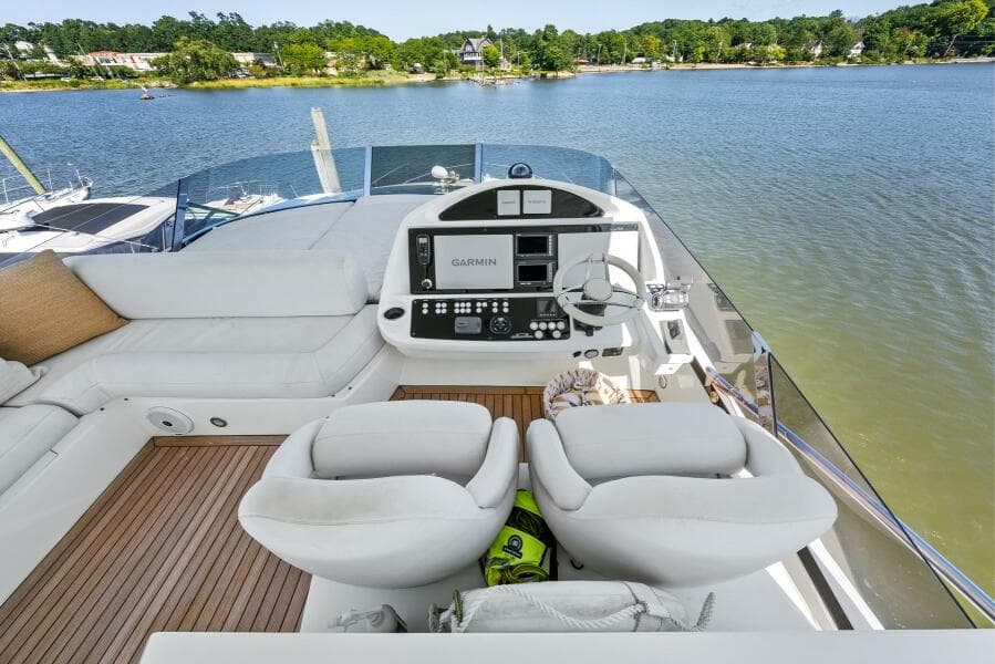 Flybridge of 2016 Sunseeker Manhattan 65 yacht with luxurious seating and navigation controls.
