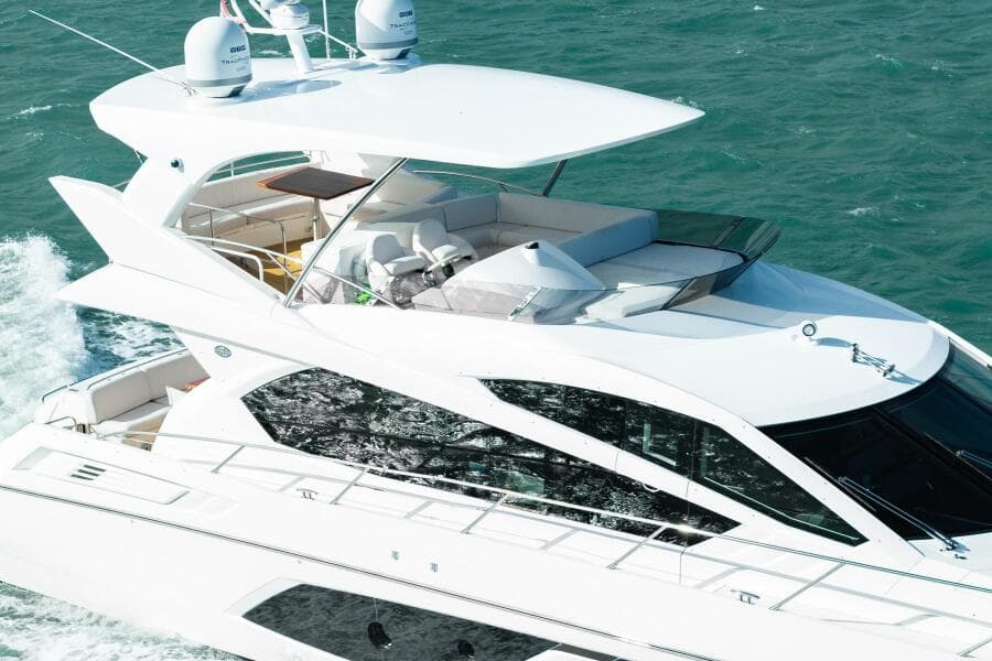 2016 Sunseeker Manhattan 65 yacht cruising on open water.