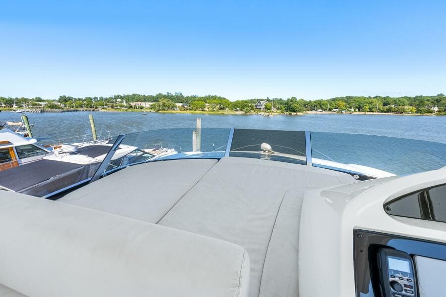 Sunseeker Manhattan 65 yacht deck with scenic waterfront view, 2016 model.