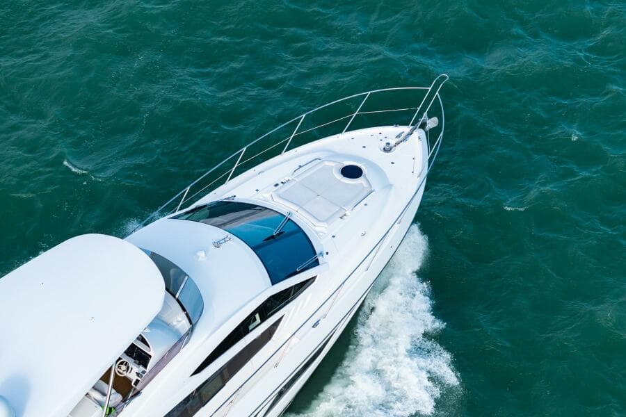 2016 Sunseeker Manhattan 65 yacht cruising on open water.
