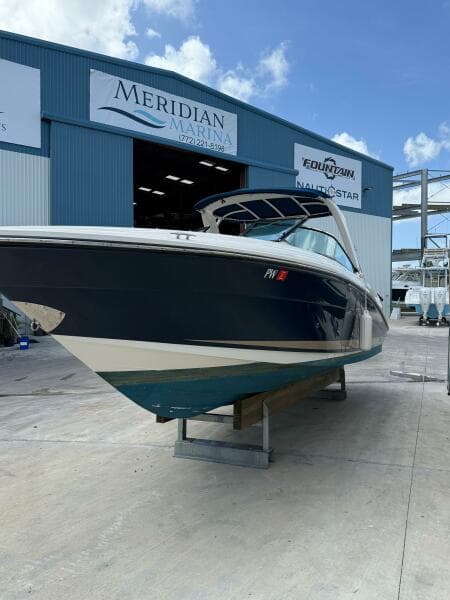 2014 Sea Ray 270 SLX boat at Meridian Marina, blue sky background.