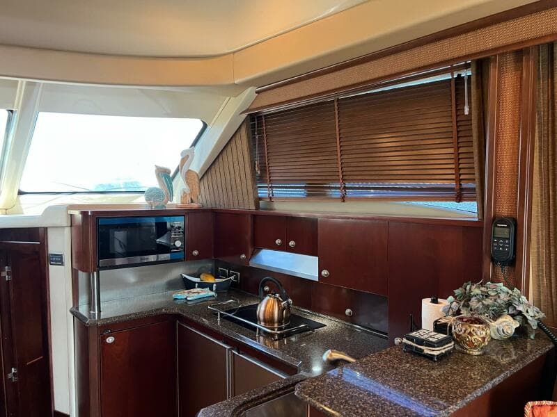 Luxurious kitchen interior of 2005 Sea Ray 500 Sedan Bridge yacht.