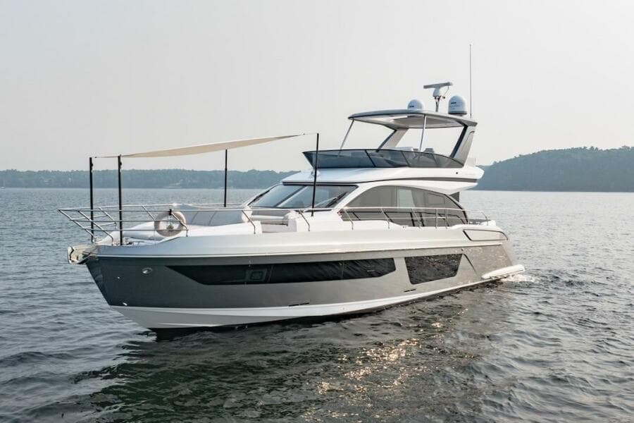 2023 Azimut Fly 53 yacht cruising on calm waters.